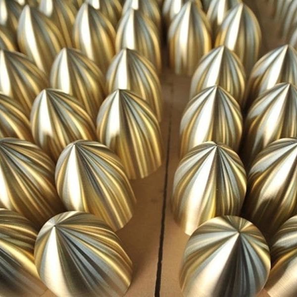 High‑precision copper transmitter shell for UAV applications, manufactured by metal spinning with a 2mm wall thickness and Ø182×H320 dimensions. Finished with a polished surface for enhanced appearance and corrosion resistance, offering excellent strength