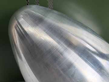 Precision aluminum metal spinning for aerospace UAV housings.