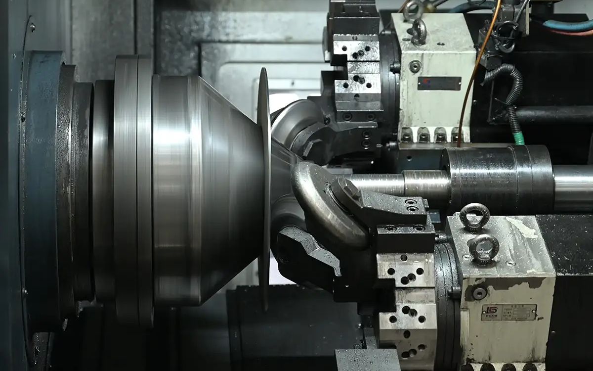 Industrial metal spinning and spinforming manufacturing process.