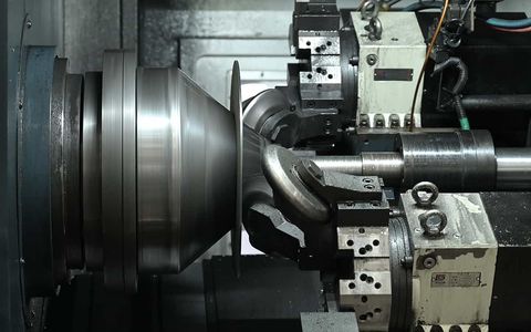 Industrial metal spinning and spinforming manufacturing process.