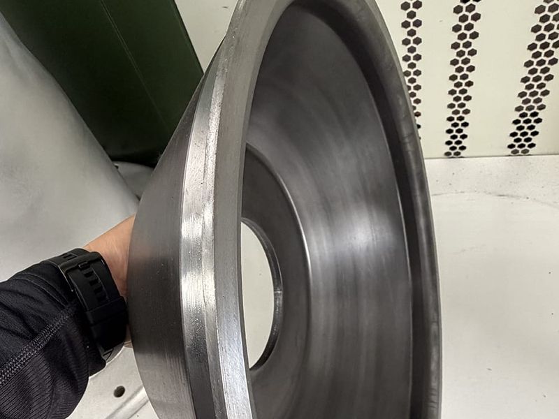 Q355B high-strength steel heavy-duty rear hub disc for mining machinery with precision stamped forming.