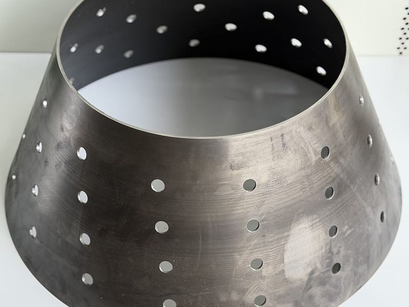 Q355D 19-layer variable diameter conical spinning part with sandblasted finish for stacked structural assembly.