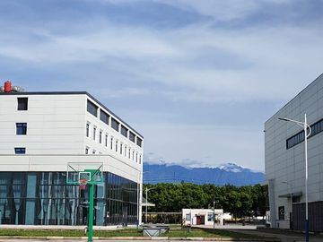 our modern metal spinning factory (KMS), featuring a clean, spacious, and eco‑friendly industrial environment. Surrounded by greenery and mountains, the plant reflects our commitment to sustainable manufacturing and a high‑quality workplace