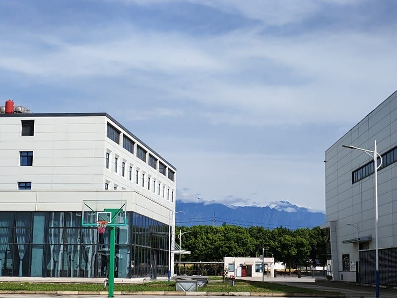 our modern metal spinning factory (KMS), featuring a clean, spacious, and eco‑friendly industrial environment. Surrounded by greenery and mountains, the plant reflects our commitment to sustainable manufacturing and a high‑quality workplace